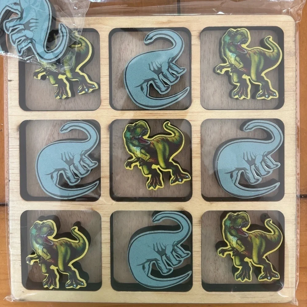 Dinosaur tick tack toe game. Brand new